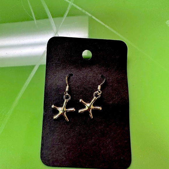 Jewelry - Handcrafted Beautiful sterling silver star fish earrings. Hand made